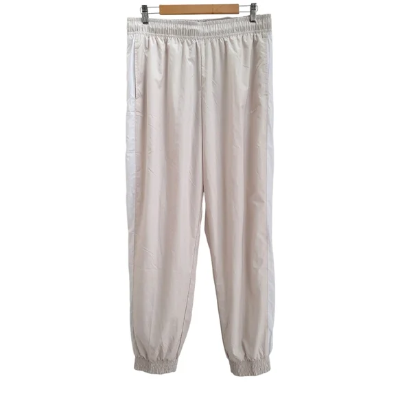 Nike Women's Loose Fit Nylon Jogger Pants Size L Mid-Rise UPF 40+ Full Length - Picture 2 of 12